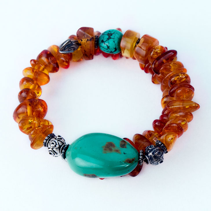 Bracelet made of genuine amber from Baltic sea - cut by hand, turquoise and silver.