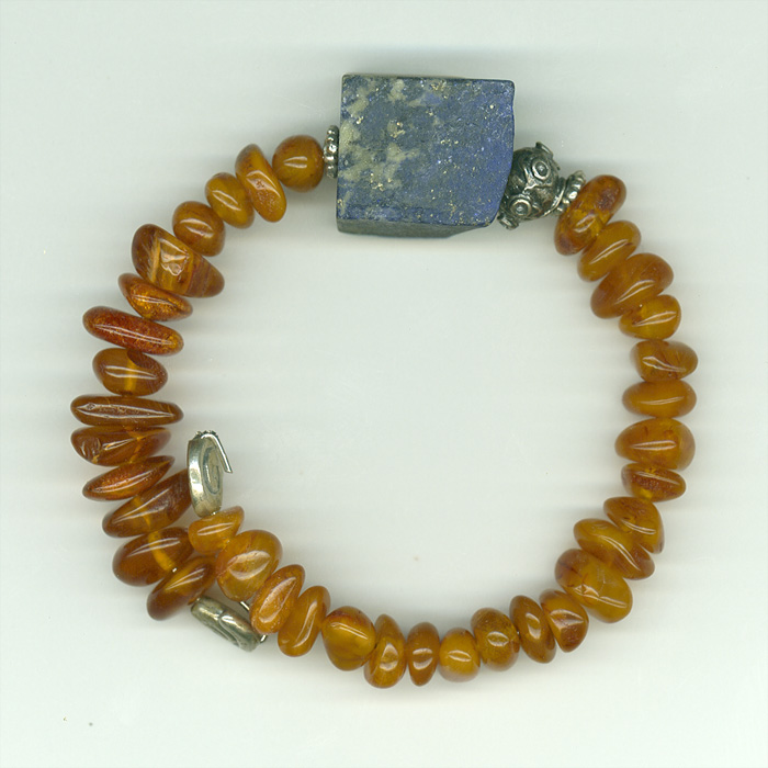 Bracelet made of genuine amber from Baltic sea-cut by hand,lapis lazuli and silver