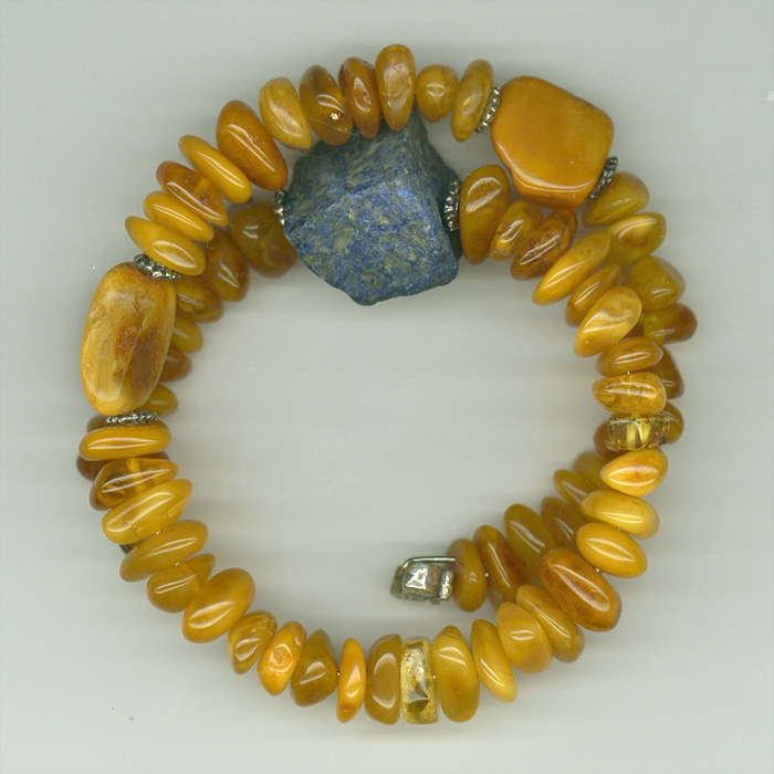 Bracelet made of genuine amber from Baltic sea-cut by hand,lapis lazuli  and silver.