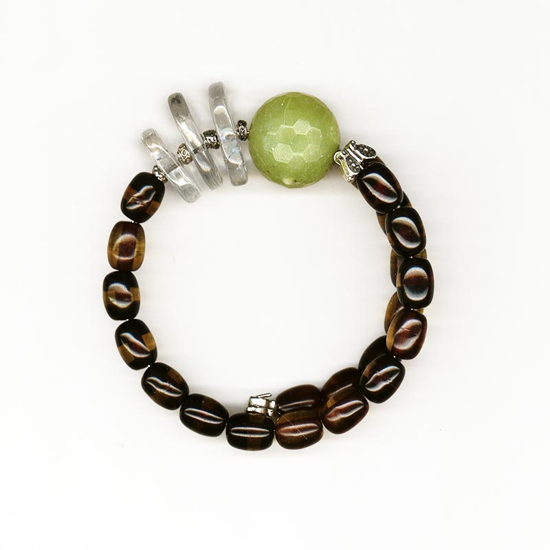Bracelet made of artificial resin, jade, quartz and tin.