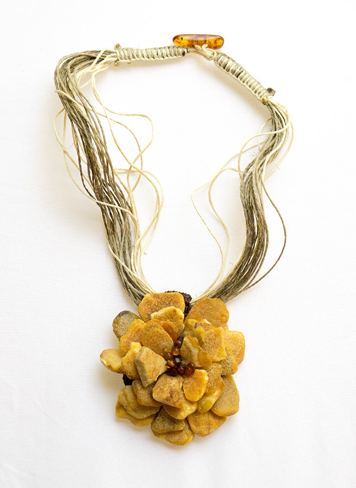 Necklace with beads made of real - genuine amber from Baltic sea - cut by hand.
