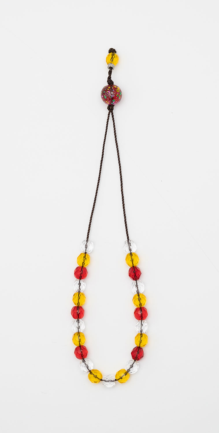 Komboloi-amulet made of crystal -  multi-edged (white-yellow-red)