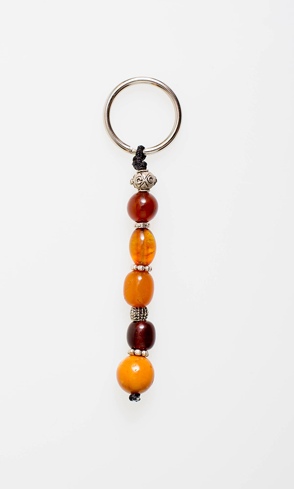 Keyring from Baltic Sea amber, tin and silver 