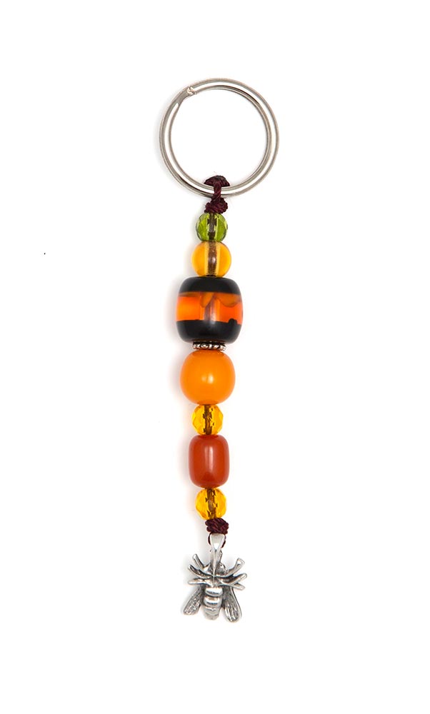 Keyring made of artificial resin and crystal  with a Bee