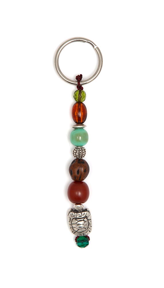 Keyring amulet made of artificial resin, crystal and Conifer seed with  a Turtle
