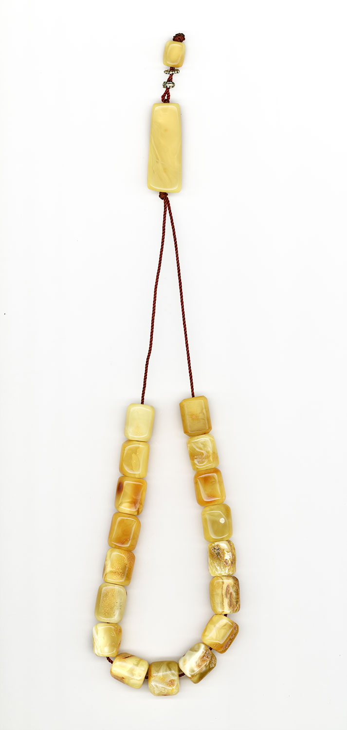 Komboloi made of genuine amber from Baltic sea- cut by hand - Royal yellow