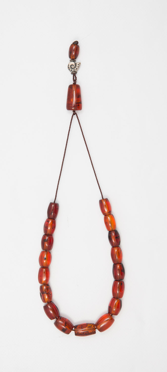 Komboloi made of genuine amber from Baltic sea-cut by hand - Golden brown.