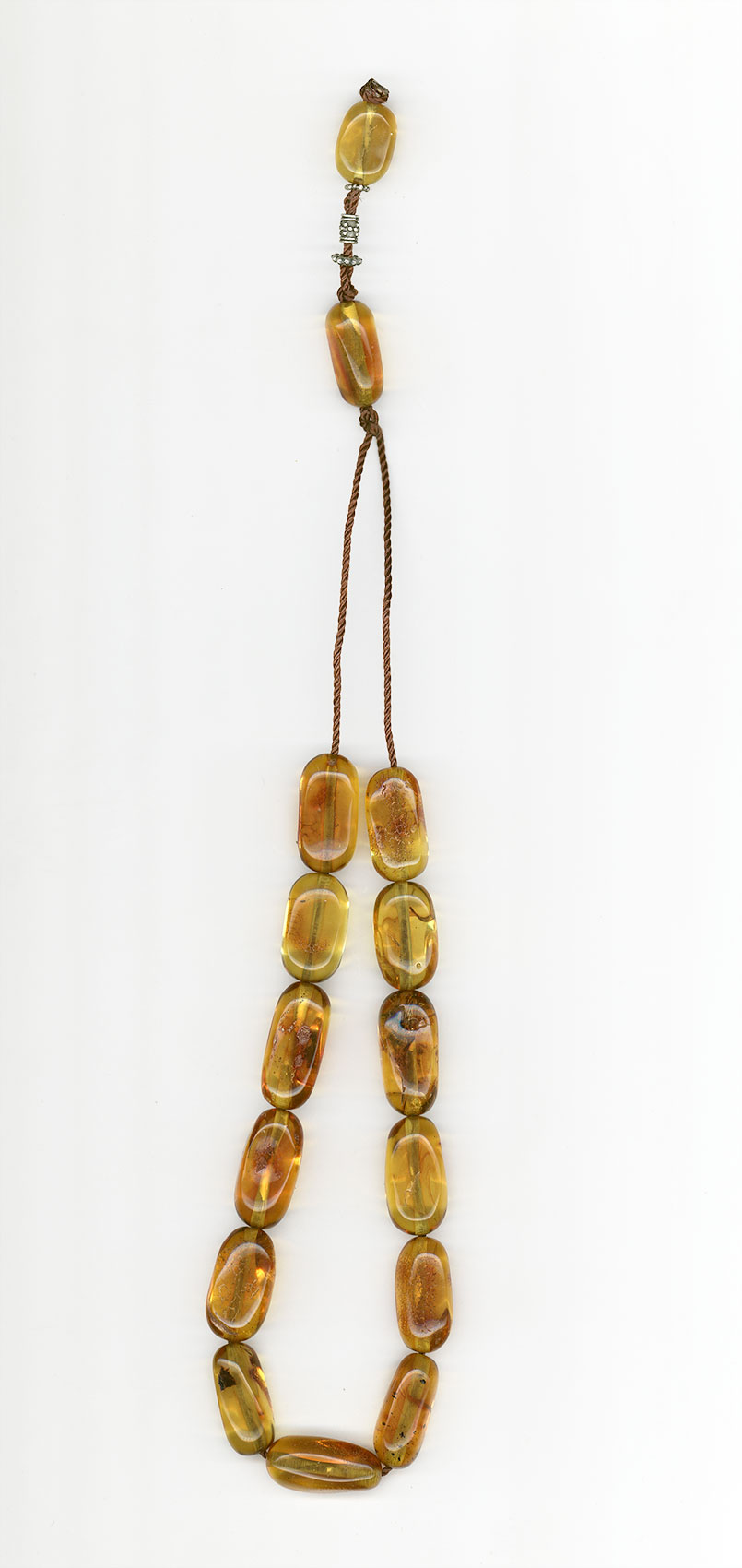 Komboloi made of genuine amber from Baltic sea- cut by hand- Golden brown-black.
