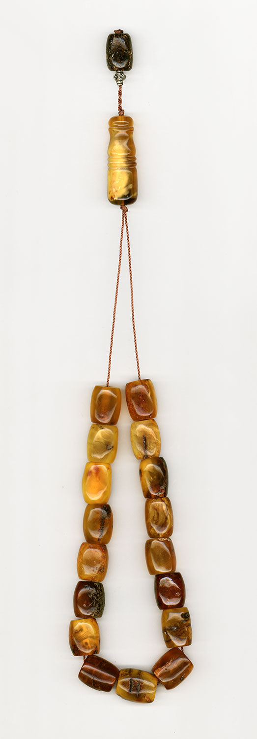Komboloi made of genuine amber from Baltic sea- cut by hand - Orange.