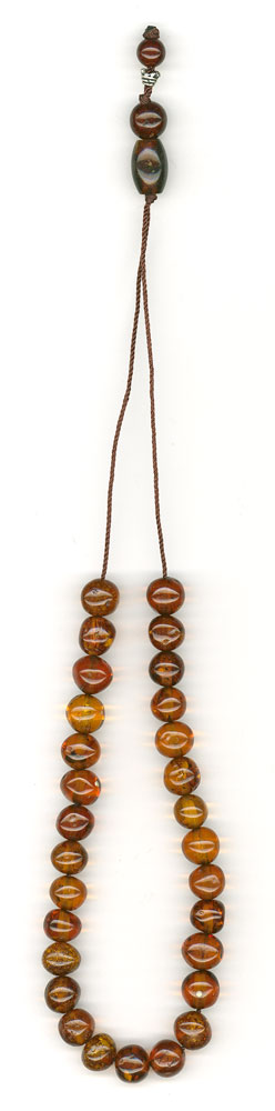 Komboloi made of genuine amber from Baltic sea- cut by hand.