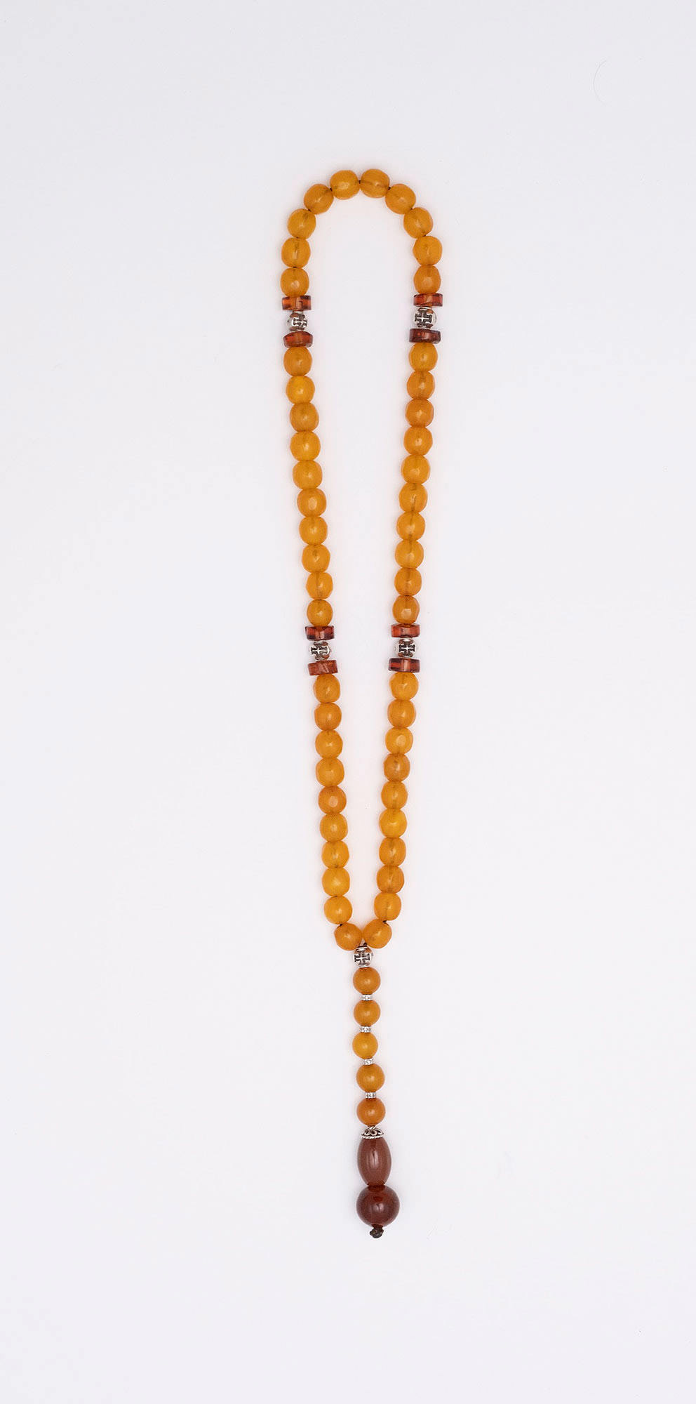 Catholic Prayer beads (Rozary) made of old mixture of artificial resins (Egypt 1960), Amber from Baltic Sea (Cut by hand and Ambroid) and Tin.