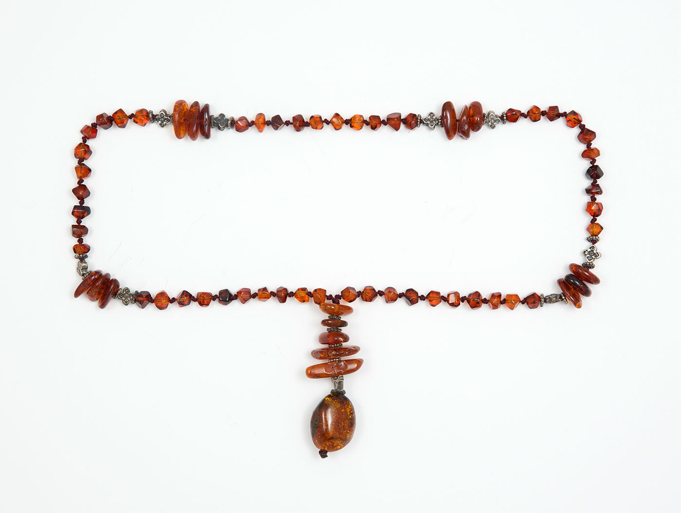Catholic prayer object-Rosary-made of genuine amber from Baltic sea - cut by hand. and silver